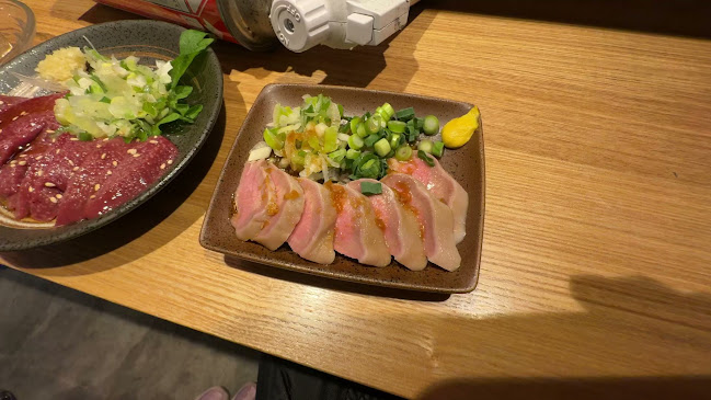 動物園通りもつ肉店 - 飲食業