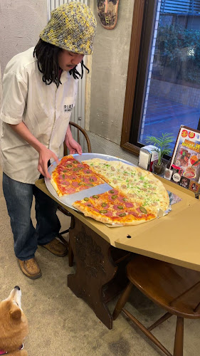 Opinii despre ピザモンスターヒダリ în 京都市 - 飲食業