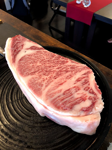 ステーキハウス 一牛 - 飲食業