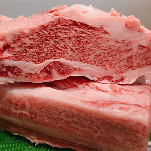 炭火焼肉 トロとん亭 - 飲食業