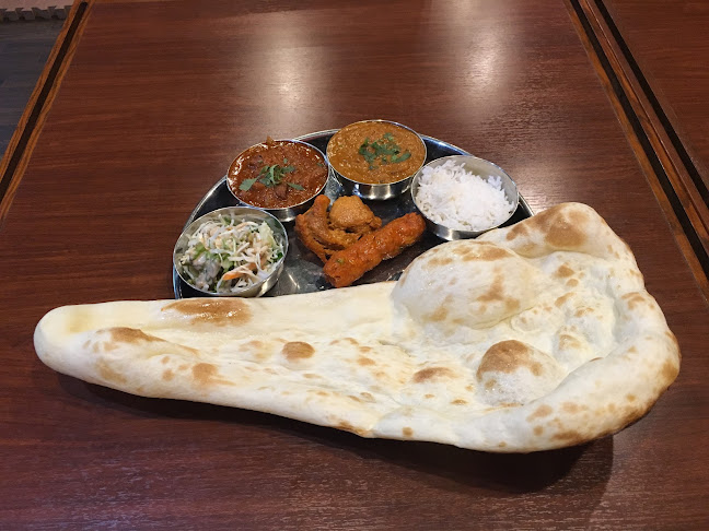 Opinii despre インドレストラン＆バー ムナル în 江戸川区 - 飲食業