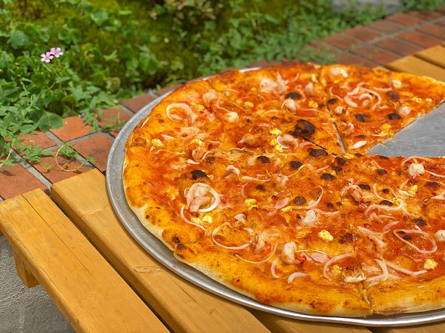 Opinii despre ピザモンスターヒダリ în 京都市 - 飲食業