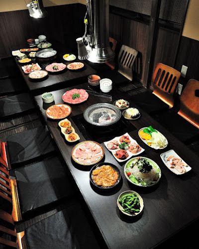 炭火焼肉 トロとん亭 - 飲食業