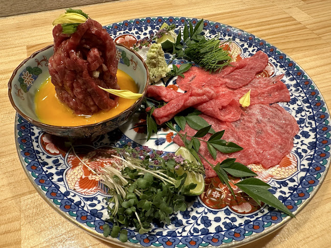 Opinii despre 牛肉料理とお酒 Lan în 大阪市 - 飲食業