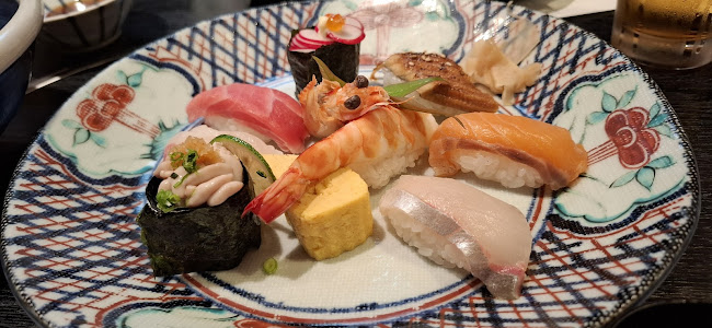 Opinii despre すし丸 本店 în 松山市 - 飲食業